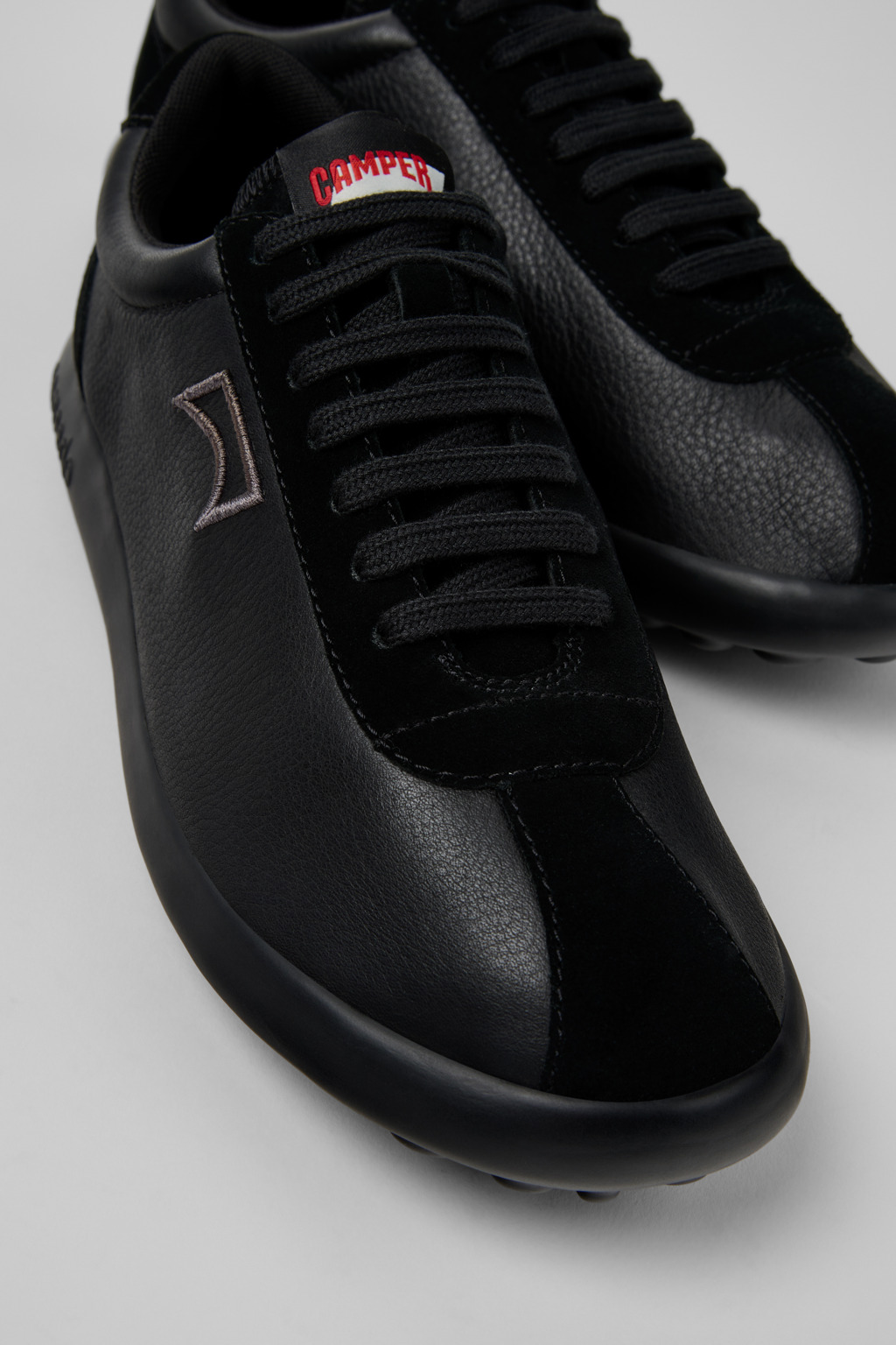 Pelotas XLF Black Leather and Nubuk Sneakers for Men.