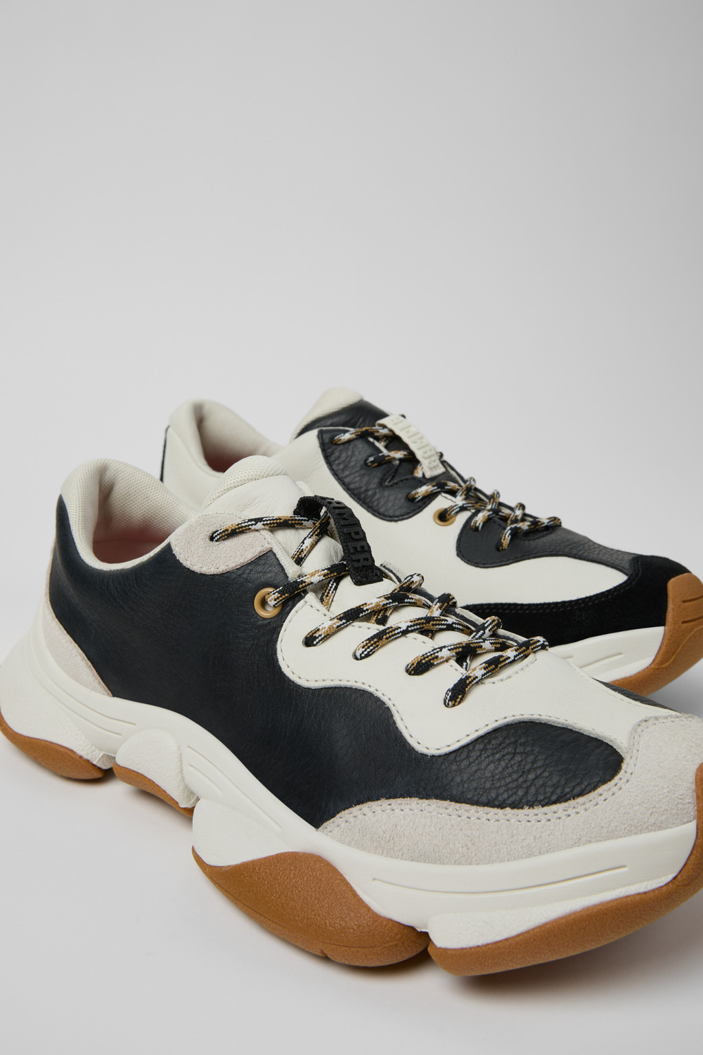 Twins White and Black Leather Sneakers for Men.