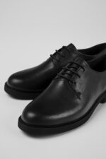 Iman Black Leather Shoes for Women.