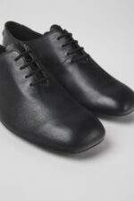 Casi Myra Black leather shoes for women