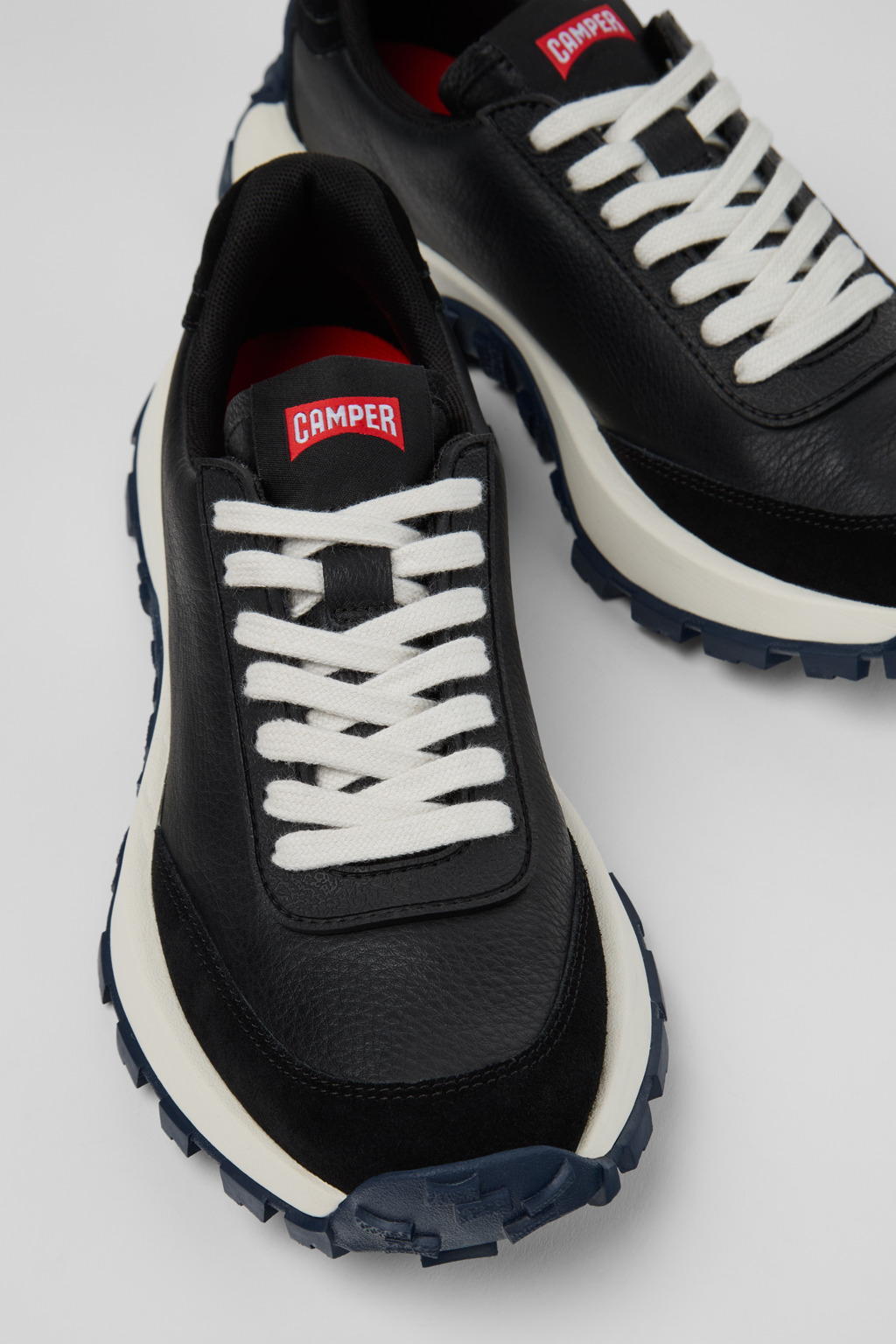 Drift Trail Black Leather Sneakers for Women.