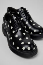 Dean Black and White Leather Shoes for Women.