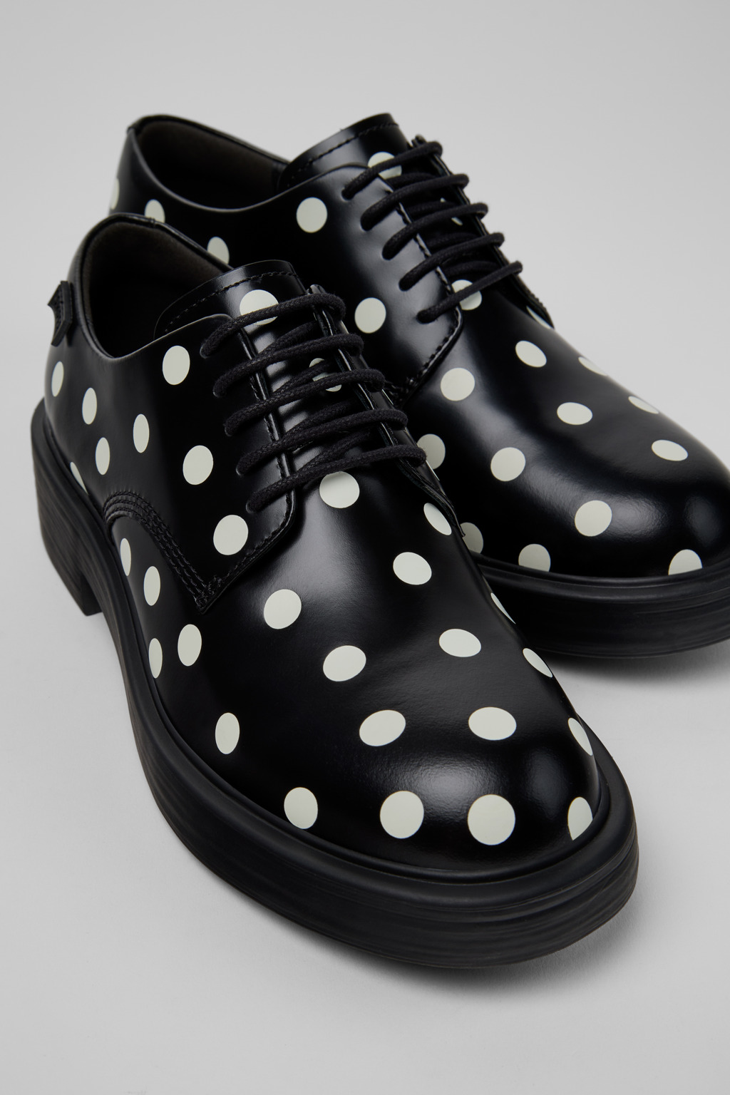 Dean Black and White Leather Shoes for Women.