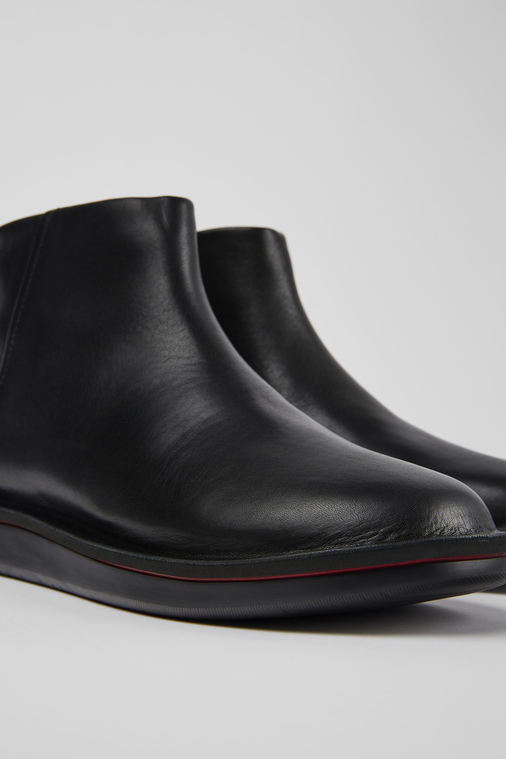 Formiga Black Leather Ankle Boots for Women.