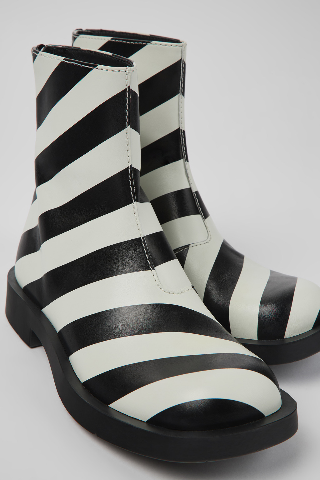 MIL 1978 Black and white leather ankle boots for women