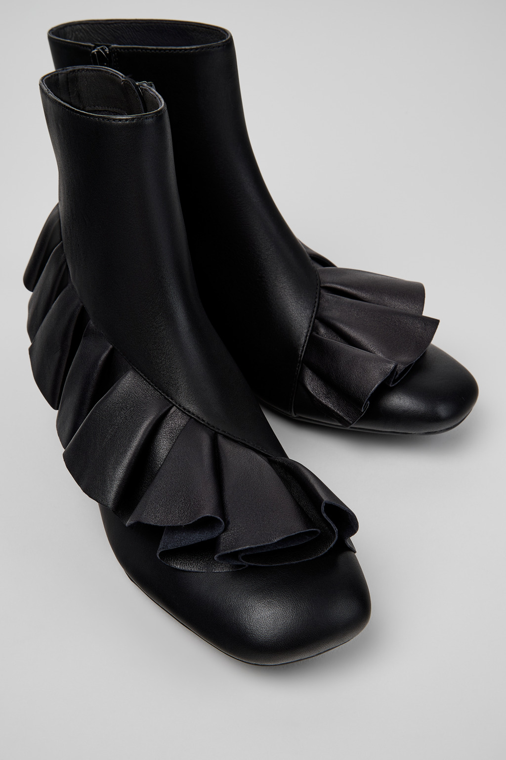 Casi Myra Black Leather Ankle Boots for Women.