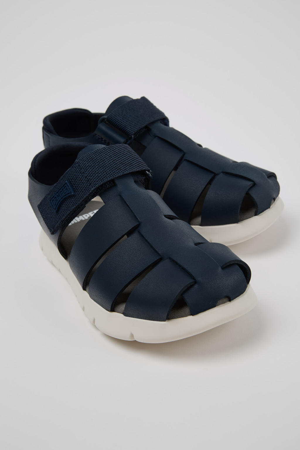 Oruga Blue Leather and Textile Closed Sandals for kids.
